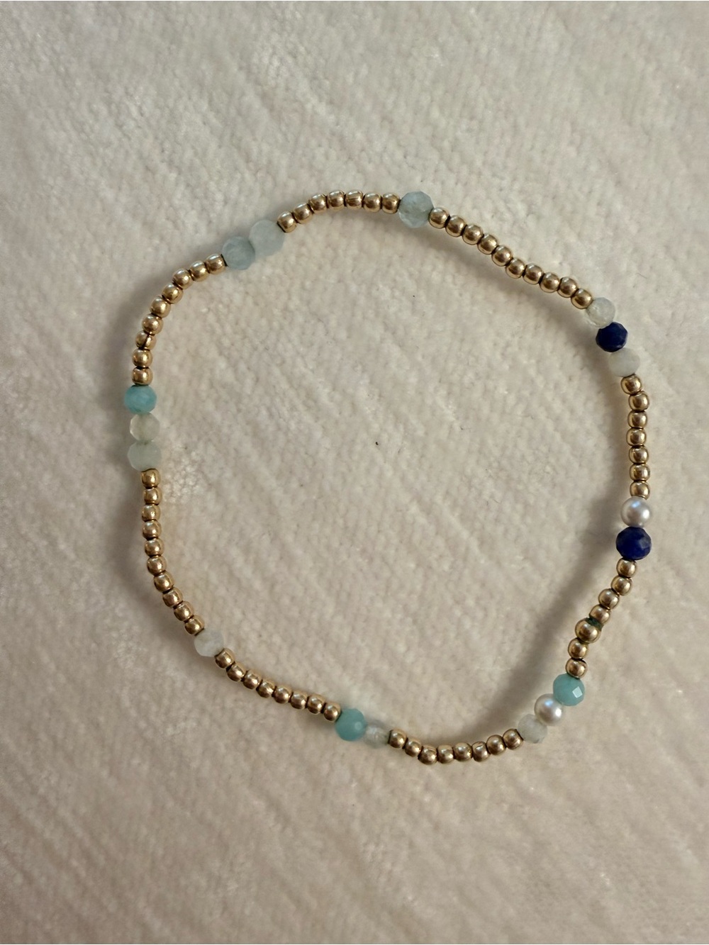 Gold Beaded Stretch Bracelet with Light Blue, Navy and White Accents